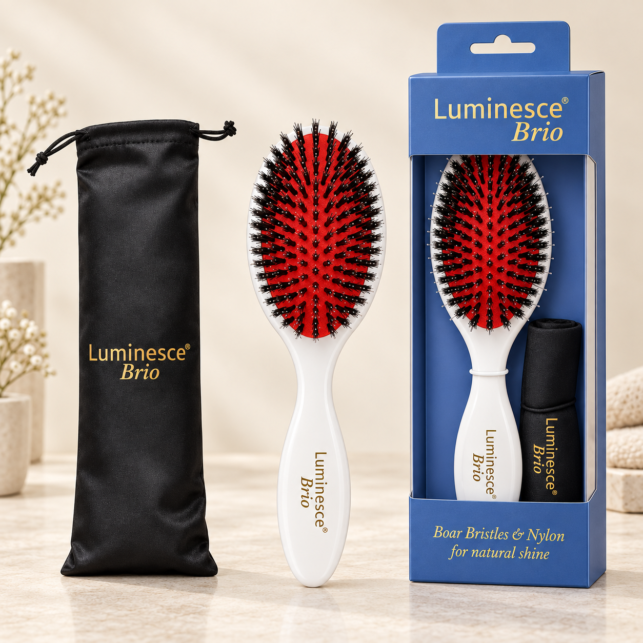 Luminesce Brio white brush, black travel pouch and blue-and-gold packaging